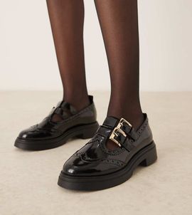 ASOS DESIGN ASOS DESIGN Wide Fit Marigold chunky buckle detail flat shoes in black