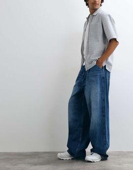 ASOS DESIGN ASOS DESIGN wide leg jeans in mid wash blue with pleats