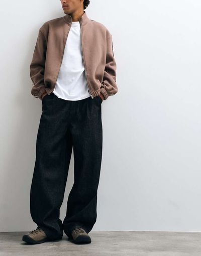 ASOS DESIGN ASOS DESIGN wide leg jeans in raw black with pleats