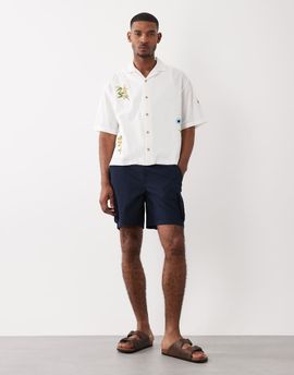 ASOS DESIGN ASOS DESIGN wide leg shorter length cargo shorts in navy ripstop