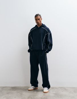 ASOS DESIGN ASOS DESIGN wide leg sweatpants with white piping in navy