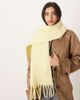ASOS DESIGN ASOS DESIGN woven fluffy tassel scarf in buttermilk yellow - 1