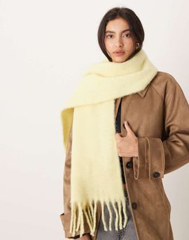 ASOS DESIGN ASOS DESIGN woven fluffy tassel scarf in buttermilk yellow