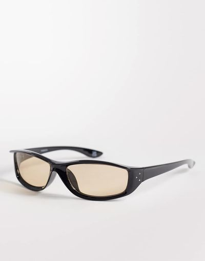 ASOS DESIGN ASOS DESIGN wrap light tint sunglasses in black frame with amber lens