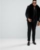 ASOS DESIGN ASOS PLUS Longline Long Sleeve T-Shirt In Subtle Acid Wash With Lace Up Neck In Black - 4