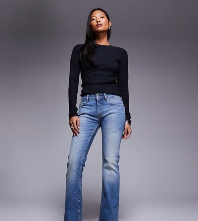 ASOS Petite ASOS DESIGN Petite bootcut jeans in midwash-Blue