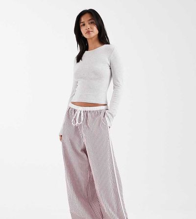 ASOS Petite ASOS DESIGN Petite crinkle tipped pull on pants with tie in pink stripe