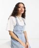 ASOS Petite ASOS DESIGN Petite denim pinny dress with button through in lightwash blue - 1