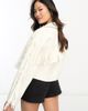 ASOS Petite ASOS DESIGN Petite festival fringe faux leather jacket in white - 1