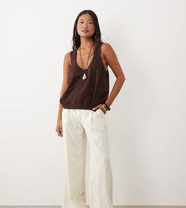 ASOS Petite ASOS DESIGN Petite linen blend wide leg pants with pleated detailing in cream-White