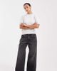 ASOS Petite ASOS DESIGN Petite low rise baggy jeans in washed black - 1