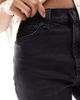 ASOS Petite ASOS DESIGN Petite mid rise flare jeans in washed black - 4