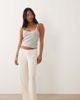 ASOS Petite ASOS DESIGN Petite mix & match rib knit wide leg pajama pants in ivory-White - 1