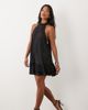 ASOS Petite ASOS DESIGN Petite plisse halter neck mini dress with ruffle hem in black - 1
