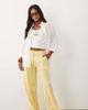 ASOS Petite ASOS DESIGN Petite relaxed straight leg pants with linen in yellow - 1