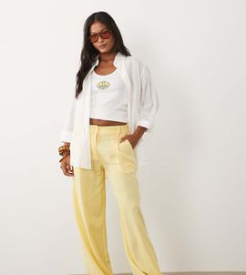 ASOS Petite ASOS DESIGN Petite relaxed straight leg pants with linen in yellow