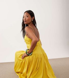 ASOS Petite ASOS DESIGN Petite satin bias shift dress with bubble hem in yellow