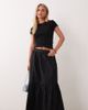 ASOS Petite ASOS DESIGN Petite single tiered boho maxi skirt in black - 1