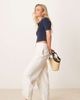 ASOS Petite ASOS DESIGN Petite tailored linen pants with multi way tab hem in ecru stripe - 1