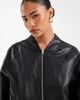 ASOS Petite ASOS DESIGN washed leather look oversized bomber jacket in washed black - 4