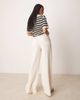 ASOS Tall ASOS DESIGN Tall cheesecloth pull on pants with raw edge in buttermilk-White - 2