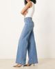 ASOS Tall ASOS DESIGN Tall high rise wide leg jeans with front pockets in mid blue - 3
