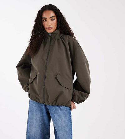 ASOS Tall ASOS DESIGN Tall oversized funnel neck bubble hem bomber jacket in khaki green