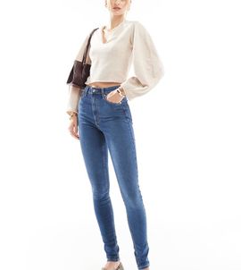 ASOS Tall ASOS DESIGN Tall skinny jeans in mid blue