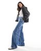 ASOS Tall ASOS DESIGN Tall soft palazzo jeans in mid wash blue - 3