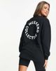 ASOS Weekend Collective ASOS Weekend Collective oversized long sleeve t-shirt with back logo in black - 4