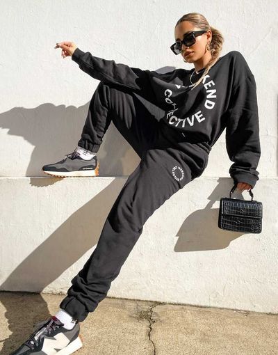 ASOS Weekend Collective ASOS Weekend Collective oversized sweatpants with logo in black