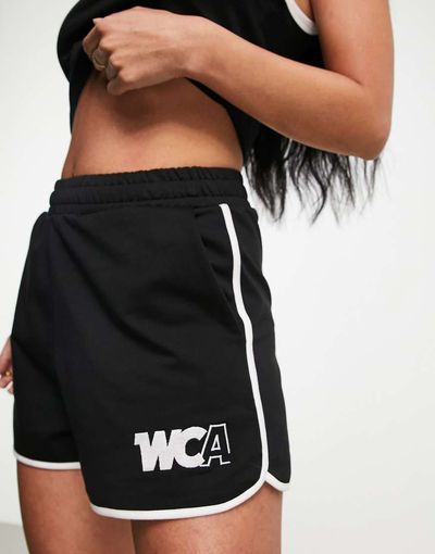 ASOS Weekend Collective ASOS Weekend Collective runner short with tipping and WCA logo in black
