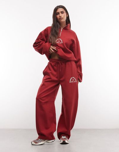ASOS Weekend Collective Weekend Collective barrel leg sweatpants with graphic in red - part of a set