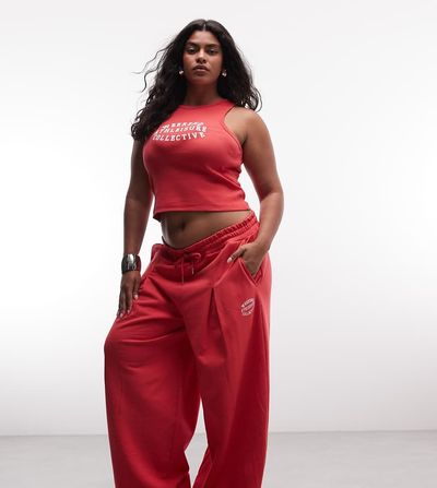 ASOS Weekend Collective Weekend Collective Curve barrel leg sweatpants with graphic in red - part of a set