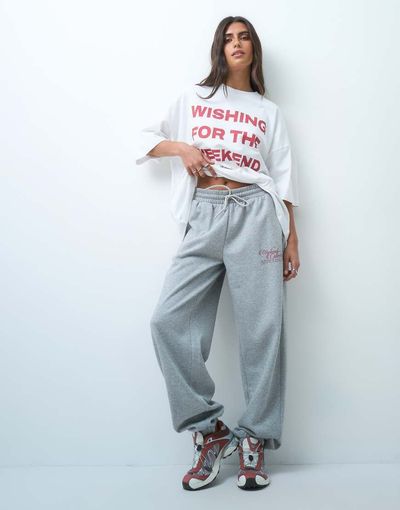 ASOS Weekend Collective Weekend Collective set baggy cuffed sweatpants with graphic in gray