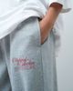 ASOS Weekend Collective Weekend Collective set baggy cuffed sweatpants with graphic in gray - 4