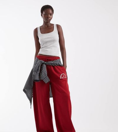 ASOS Weekend Collective Weekend Collective Tall set barrel leg sweatpants with graphic in red