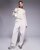ASOS Weekend Collective Weekend Collective waffle knit cardigan with woven label in stone-Neutral - 3