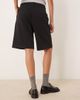 AWARE AWARE pleat front tailored shorts in black - 3