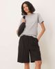 AWARE AWARE pleat front tailored shorts in black - 4