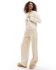 AWARE AWARE textured boucle cardigan in cream-White - 2