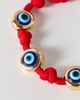 BaubleBar BaubleBar Eyes Open Evil Eye Paracord Bracelet in Red, Women's at Urban Outfitters - 2