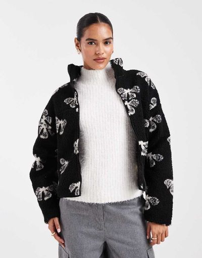 Brave Soul Brave Soul bow print full zip fleece in black and cream