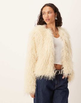 Brave Soul Brave Soul collarless short mongolian faux fur jacket in cream-White