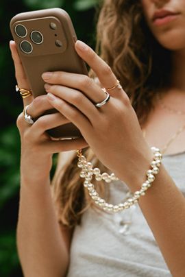 By Anthropologie Wavy Pearl Phone Chain