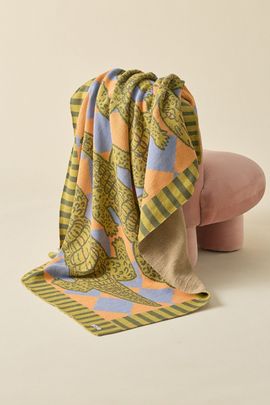 Calhoun & Co. Calhoun & Co. Alligator Patio Knit Throw Blanket in Gold at Urban Outfitters