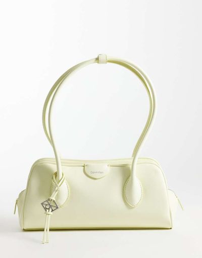 Calvin Klein Calvin Klein emblem grain texture shoulder bag with hardware charm in pale yellow-Neutral