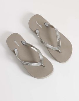 Calvin Klein Calvin Klein Jeans flatform metallic flip flop sandals in cream-White