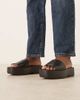 Calvin Klein Calvin Klein Jeans monogram flatform leather sandals in black - 1