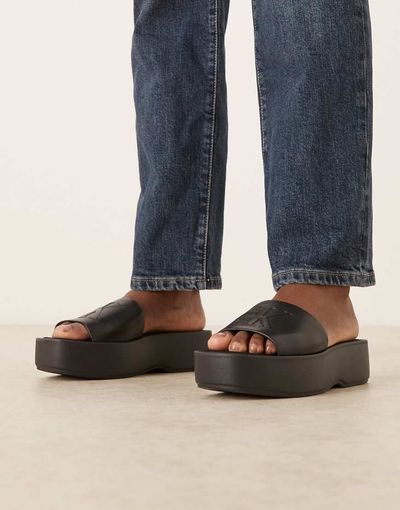 Calvin Klein Calvin Klein Jeans monogram flatform leather sandals in black